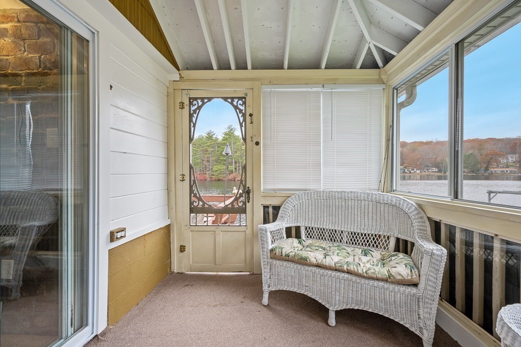 59 Cranberry Meadow Shore Road Charlton, MA 01507 - Photo 30 of 36 a white bed sitting in a room next to a window