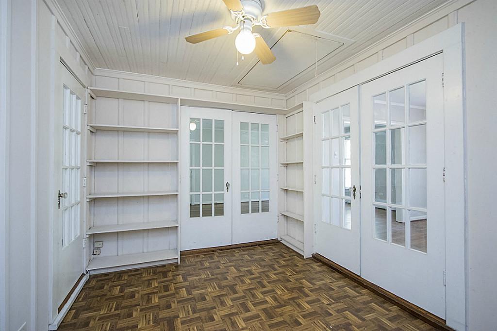 1843 Branard Street, Unit A Houston, TX 77098 - Photo 18 of 19 a view of a hallway with closet and a window