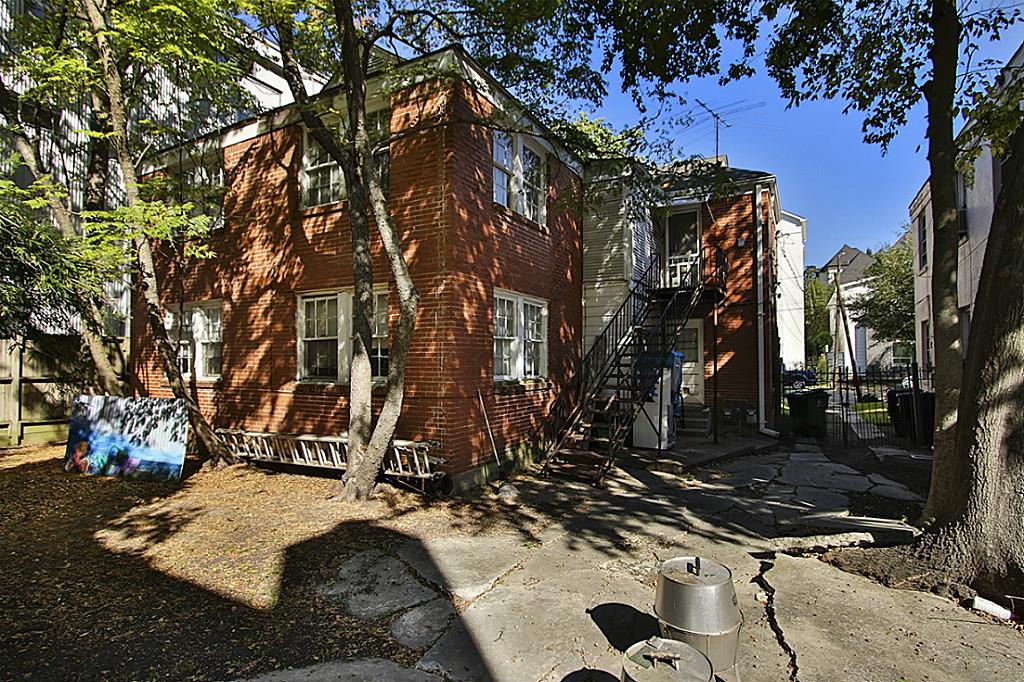 1843 Branard Street, Unit A Houston, TX 77098 - Photo 2 of 19 a view of a house with a snow on the road