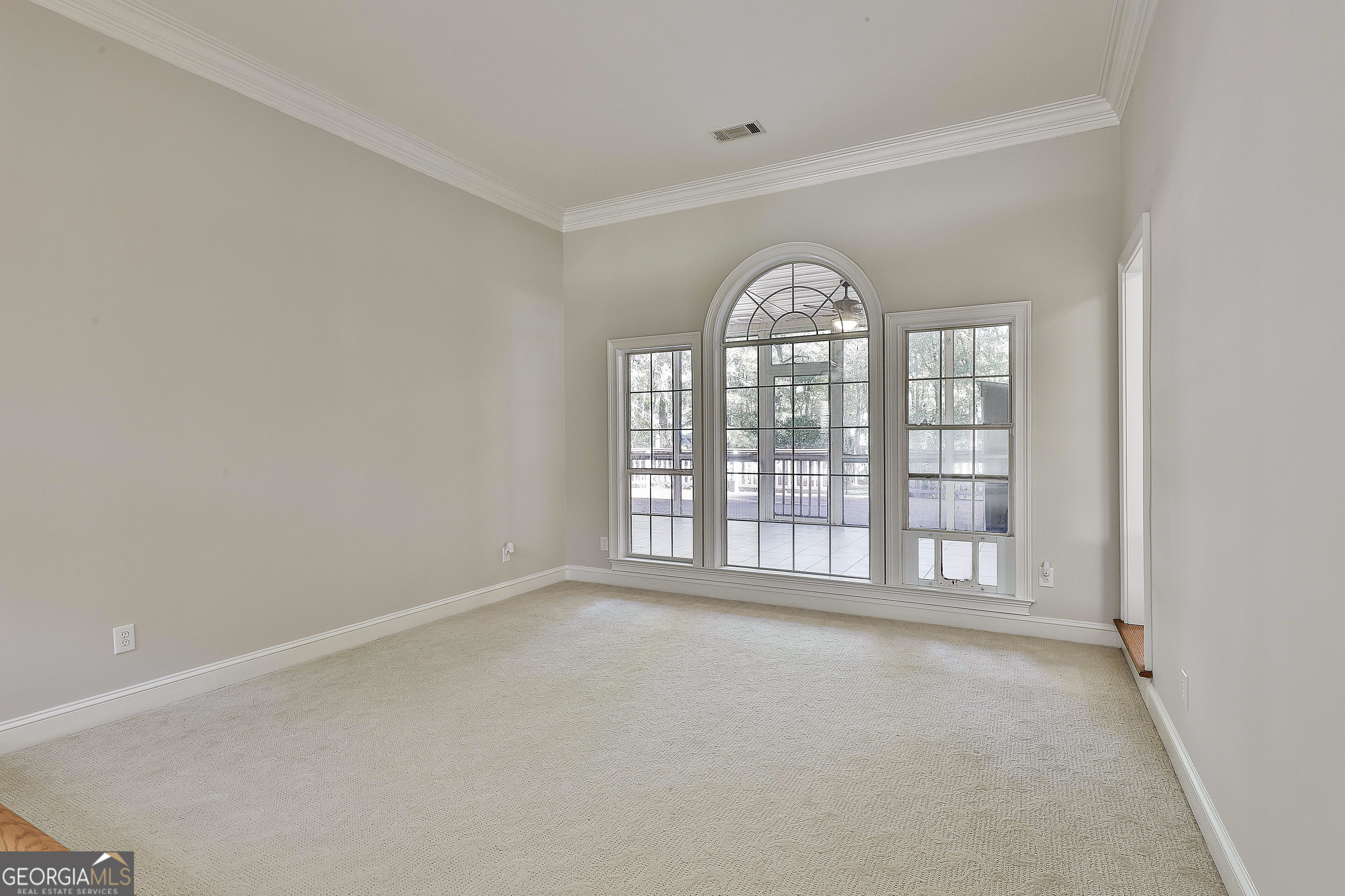 365 Pendleton Trail Tyrone, GA 30290 - Photo 14 of 55 a view of an empty room with a window