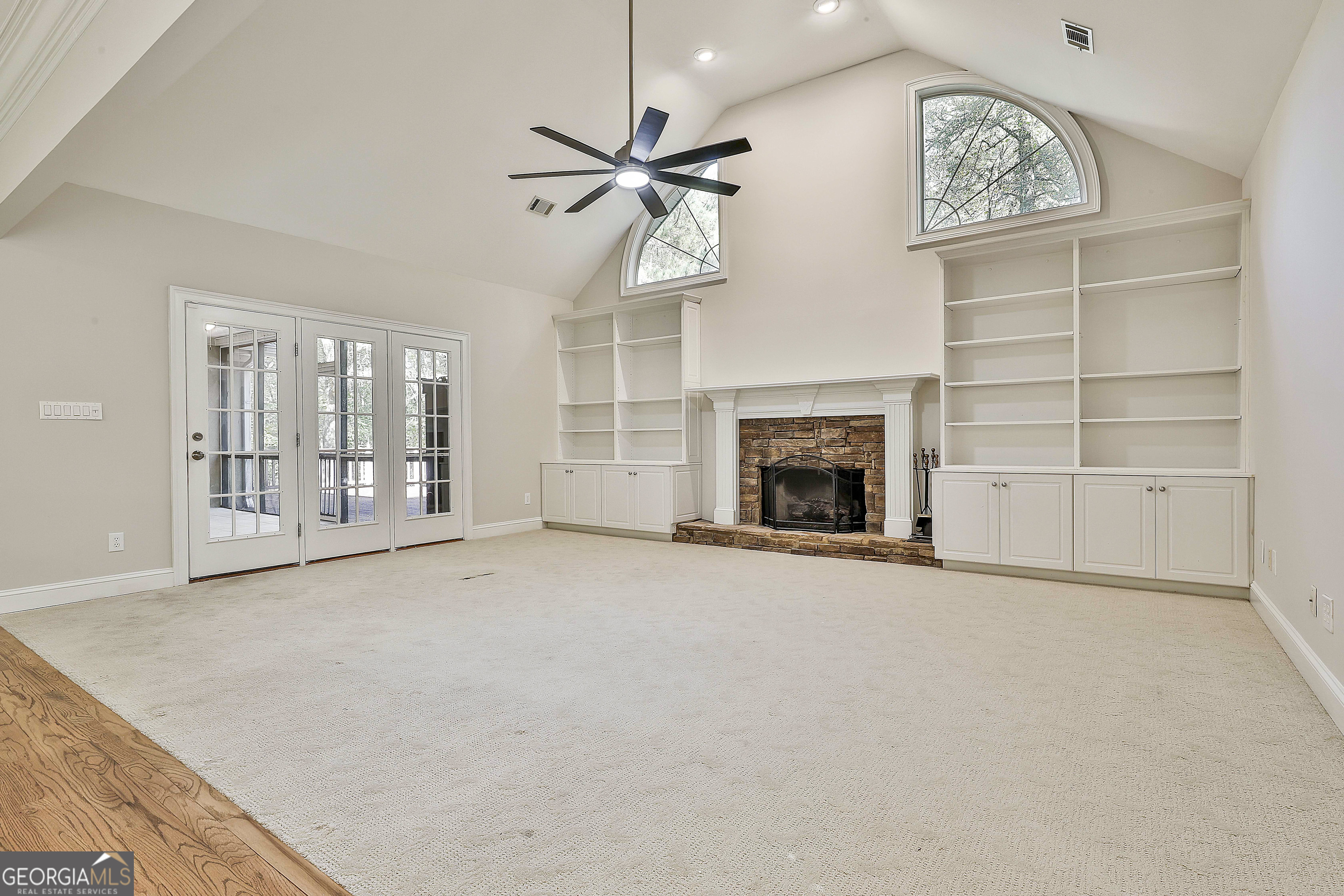365 Pendleton Trail Tyrone, GA 30290 - Photo 19 of 55 an empty room with windows and fireplace