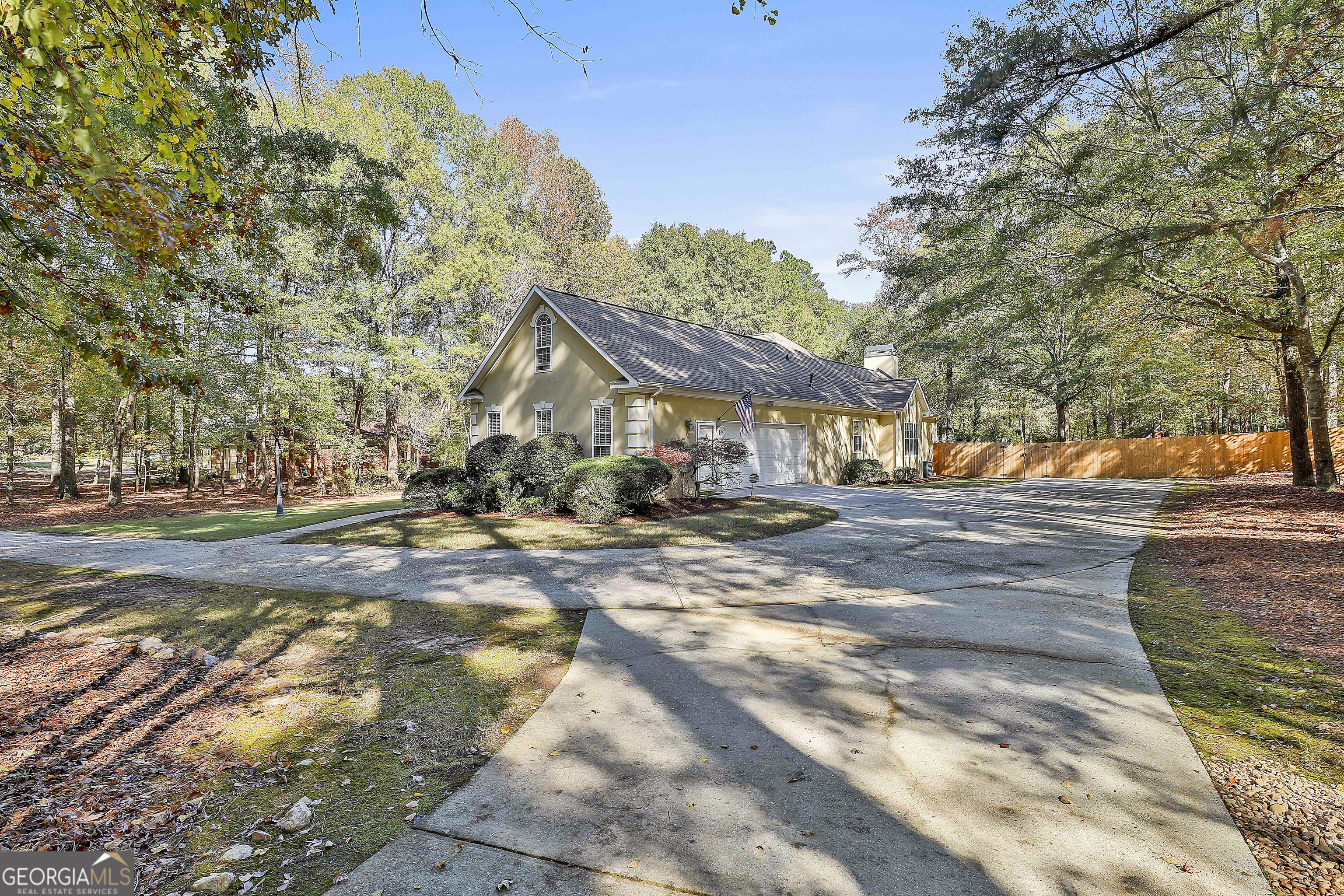 365 Pendleton Trail Tyrone, GA 30290 - Photo 3 of 55 a view of road with large trees