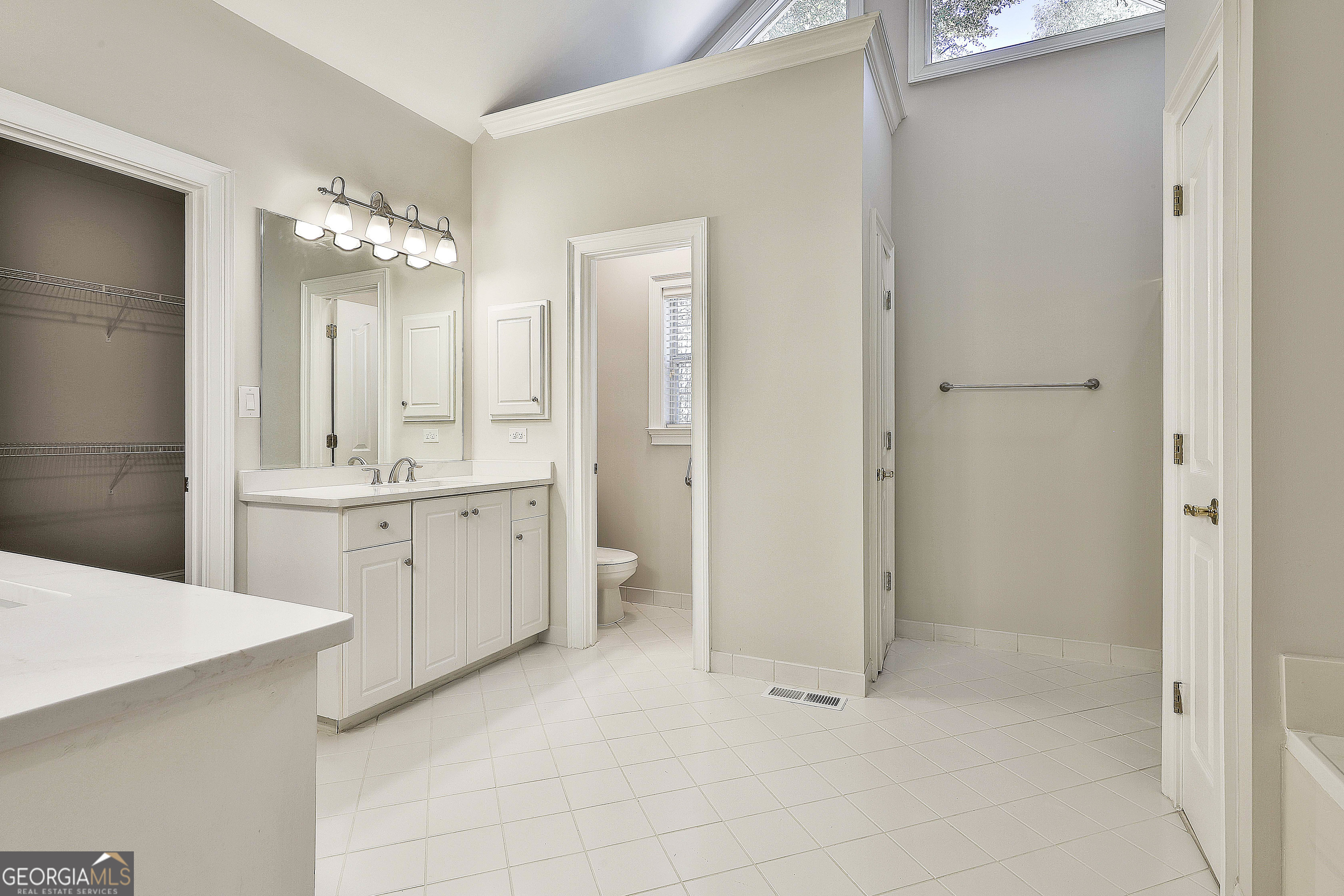 365 Pendleton Trail Tyrone, GA 30290 - Photo 36 of 55 a bathroom with a double vanity sink mirror and a