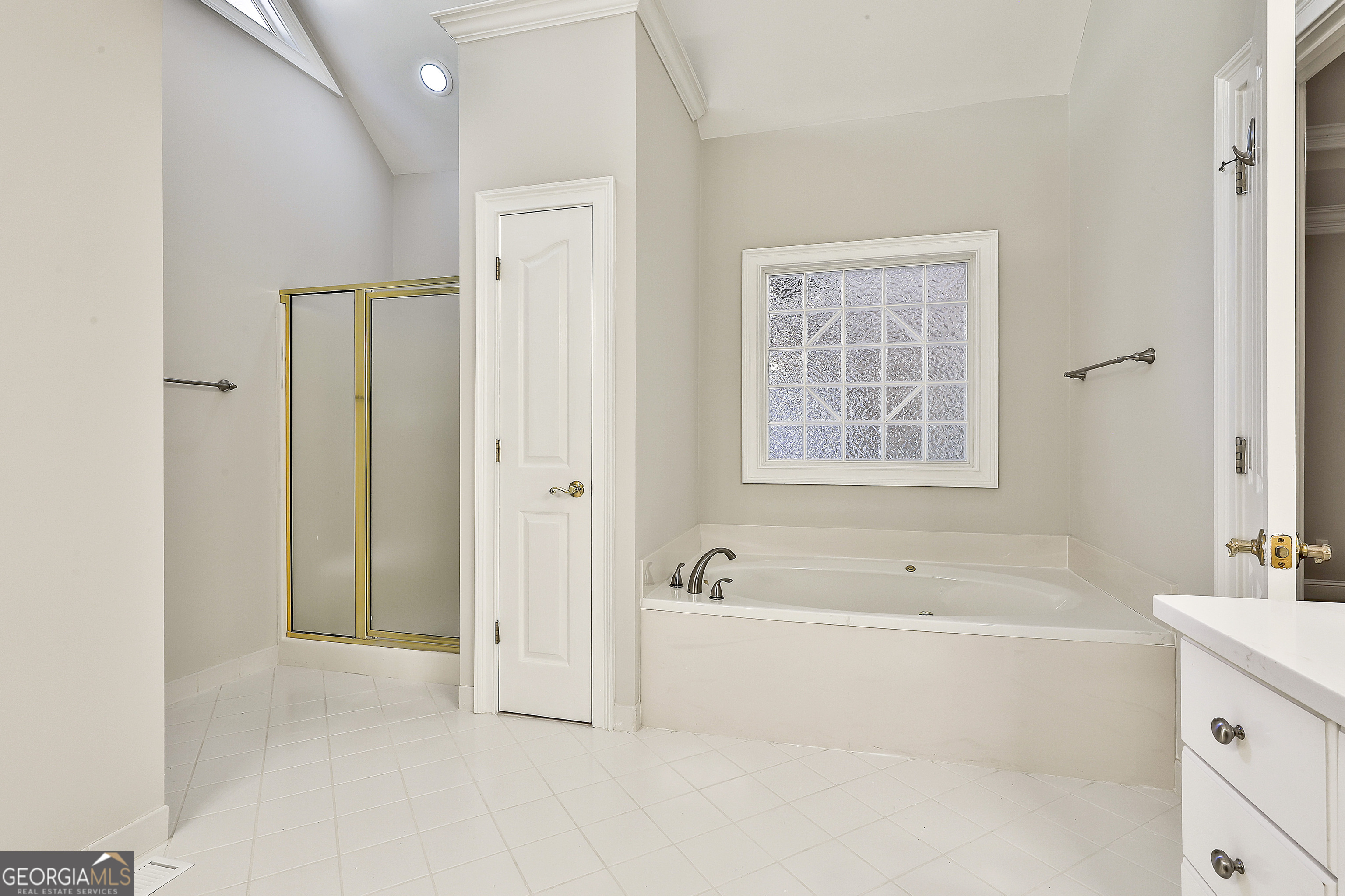 365 Pendleton Trail Tyrone, GA 30290 - Photo 37 of 55 a bathroom with a bathtub and a sink