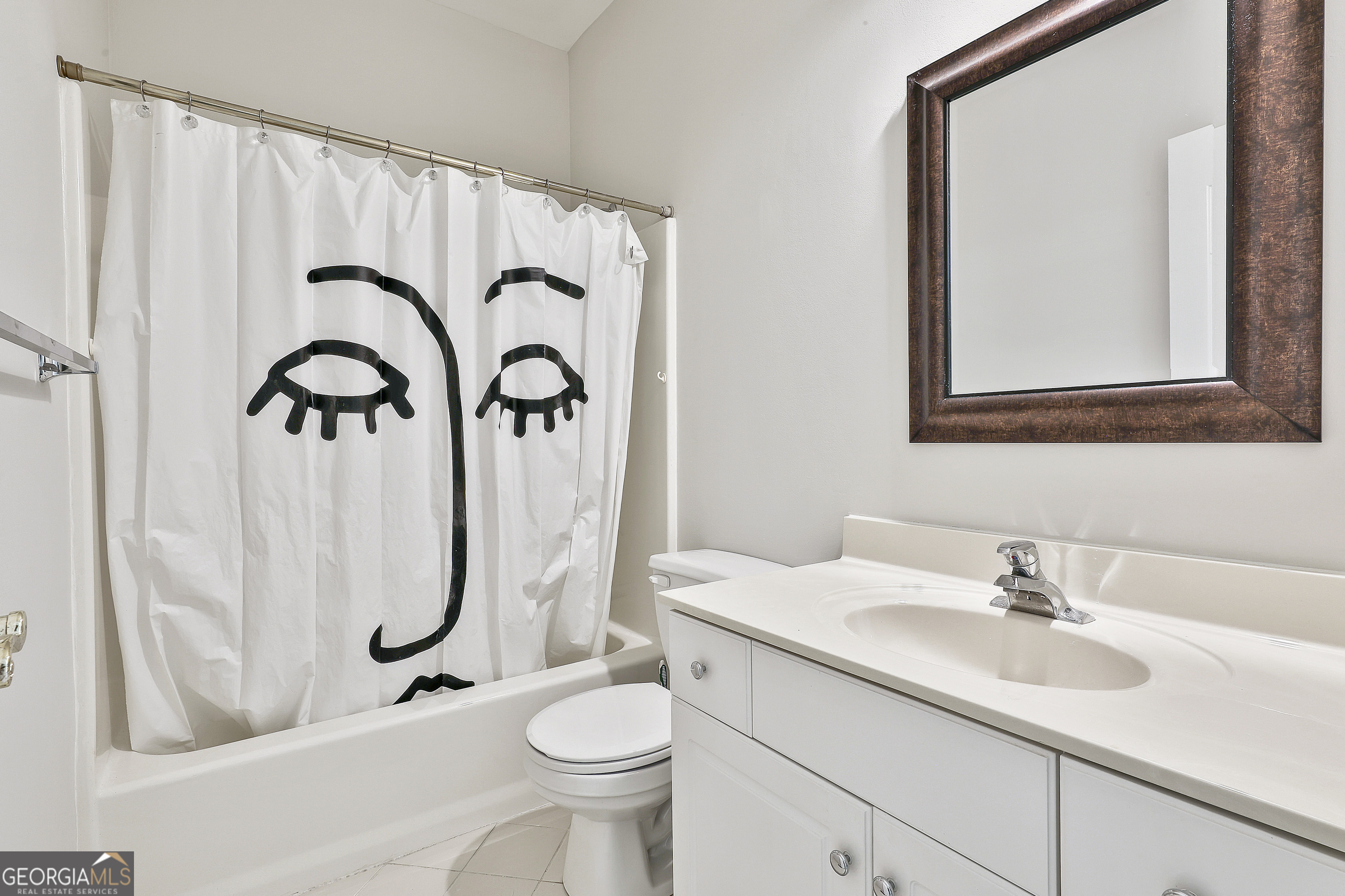 365 Pendleton Trail Tyrone, GA 30290 - Photo 41 of 55 a bathroom with a sink a toilet and a mirror
