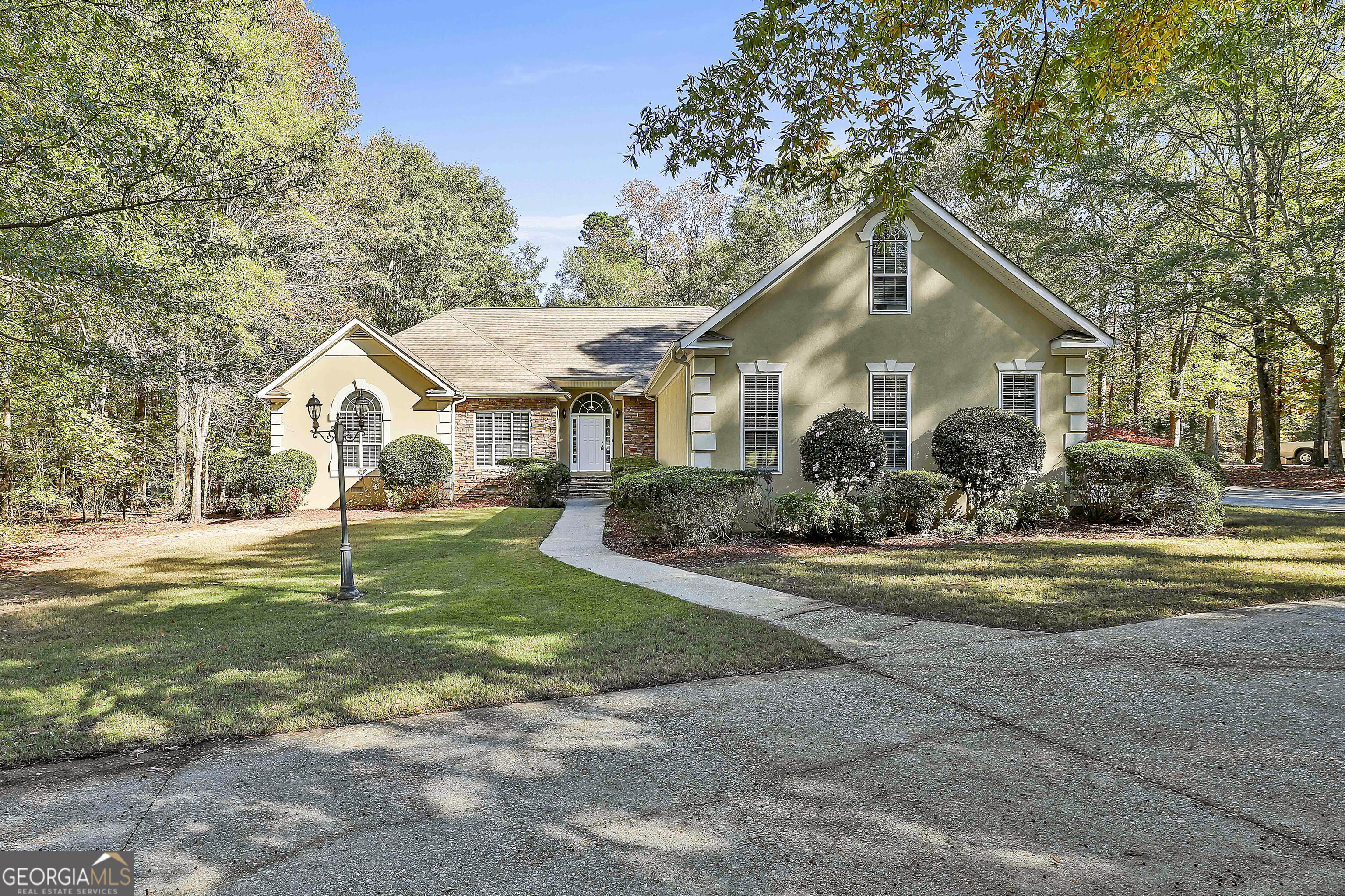 365 Pendleton Trail Tyrone, GA 30290 - Photo 5 of 55 a house view with a garden space