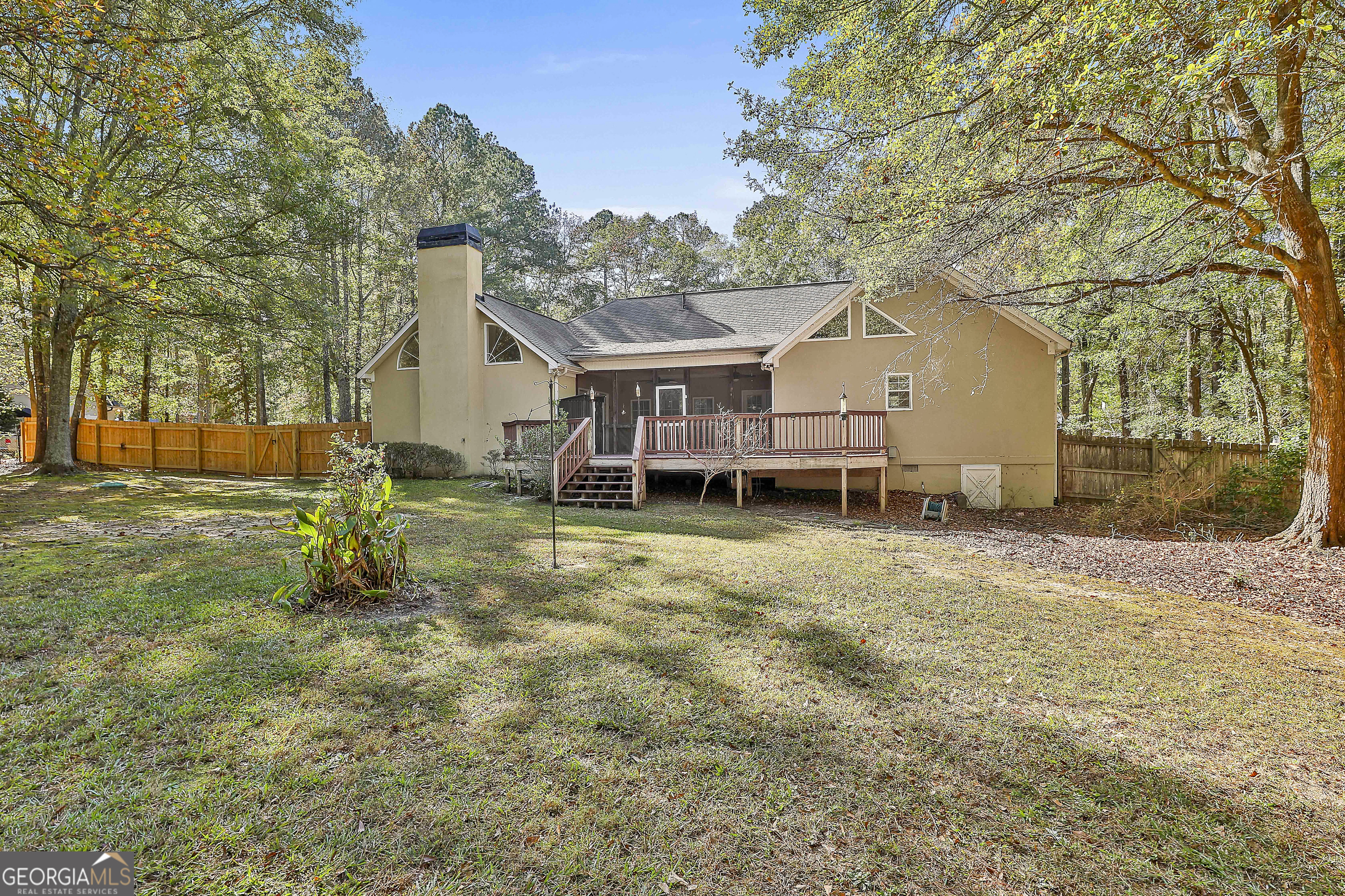 365 Pendleton Trail Tyrone, GA 30290 - Photo 51 of 55 a backyard of a house with table and chairs