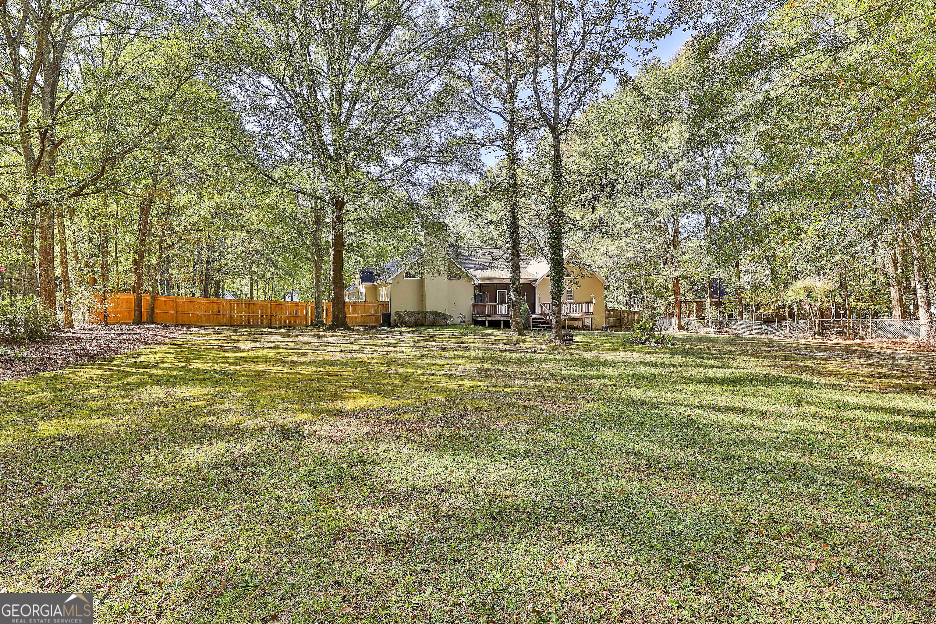 365 Pendleton Trail Tyrone, GA 30290 - Photo 53 of 55 a swimming pool view with large trees