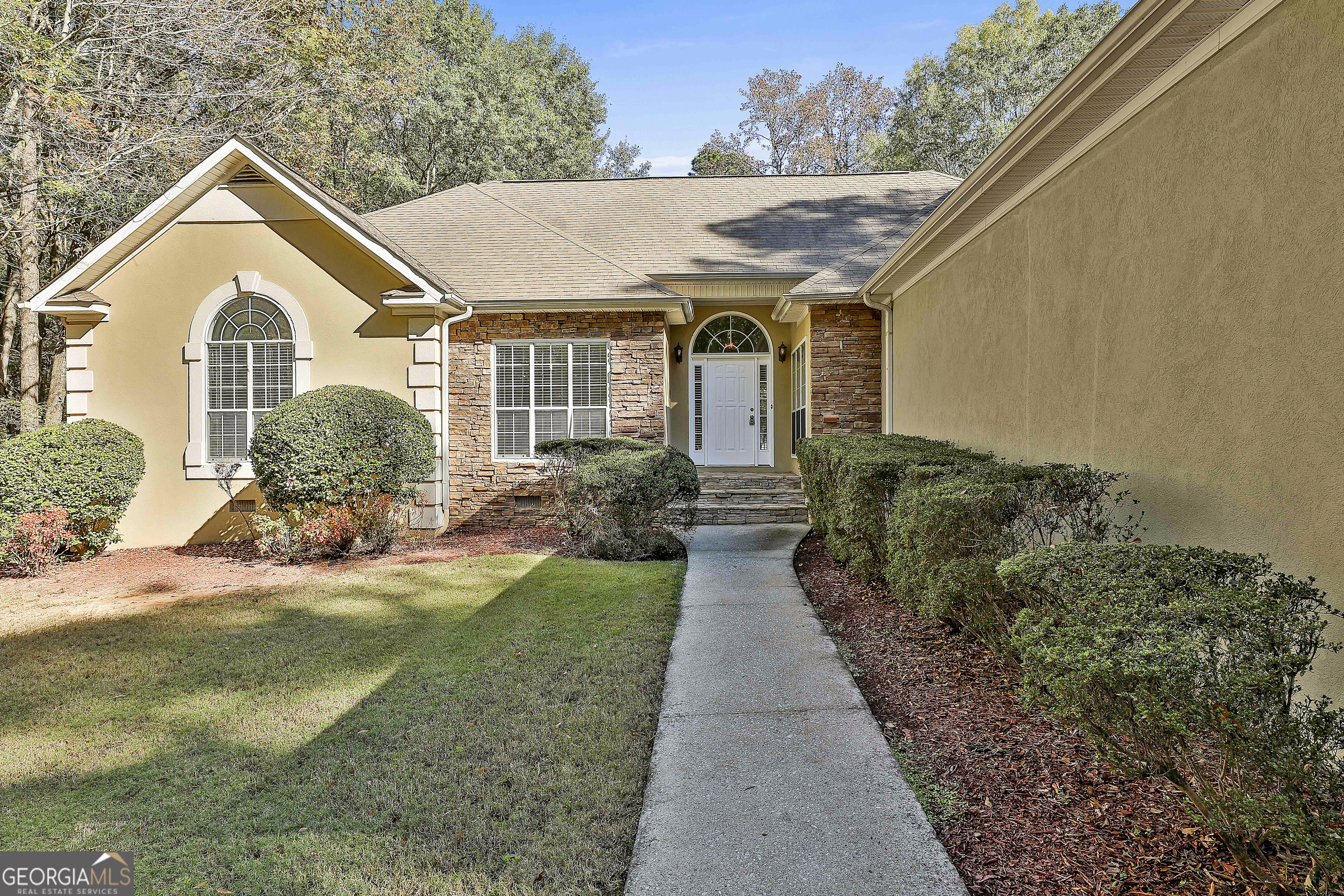 365 Pendleton Trail Tyrone, GA 30290 - Photo 8 of 55 a front view of a house with a yard