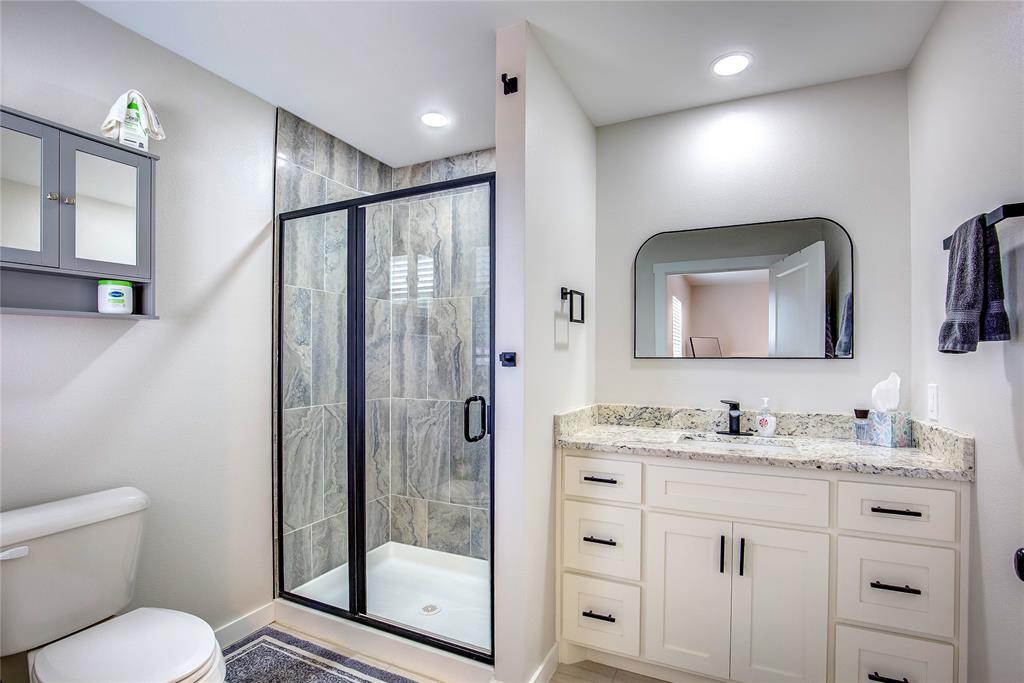 521 Private Road Brookston, TX 75421 - Photo 11 of 26 a bathroom with 2 sink toilet and shower