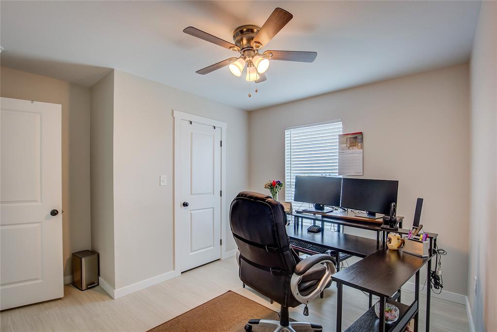521 Private Road Brookston, TX 75421 - Photo 15 of 26 a workspace with furniture and ceiling fan