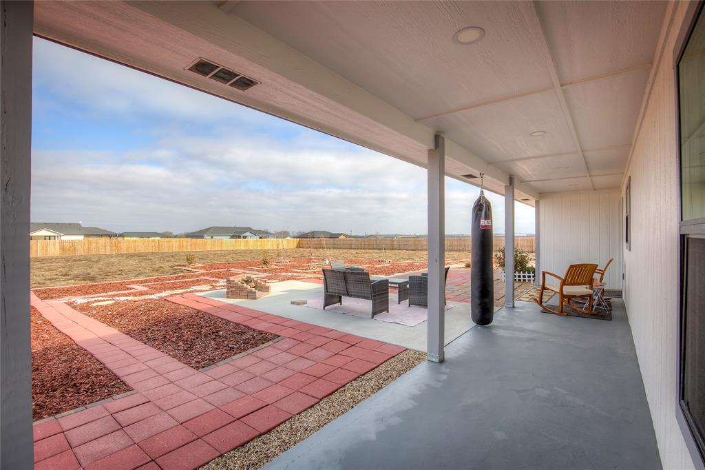 521 Private Road Brookston, TX 75421 - Photo 18 of 26 a view of a terrace with lawn chairs
