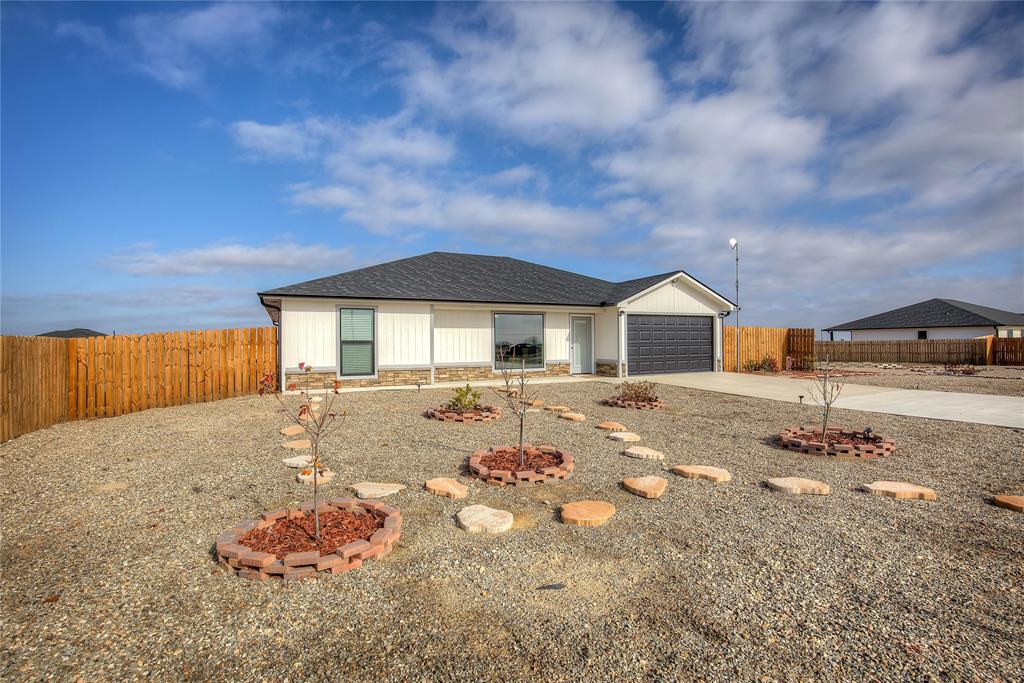 521 Private Road Brookston, TX 75421 - Photo 25 of 26 a front view of a house with a yard
