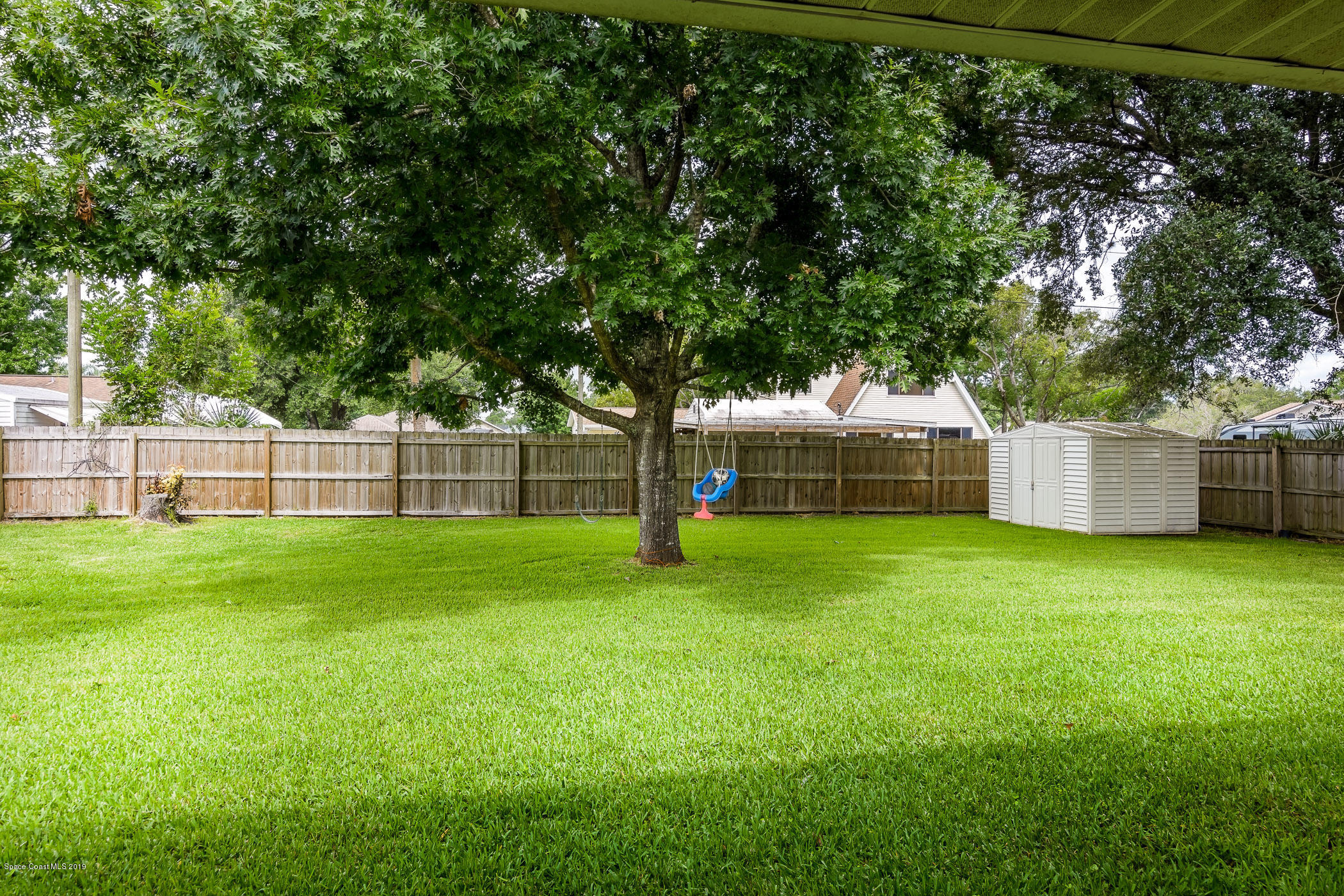 7010 Cairo Road Cocoa, FL 32927 - Photo 22 of 22 a view of a garden with a slide