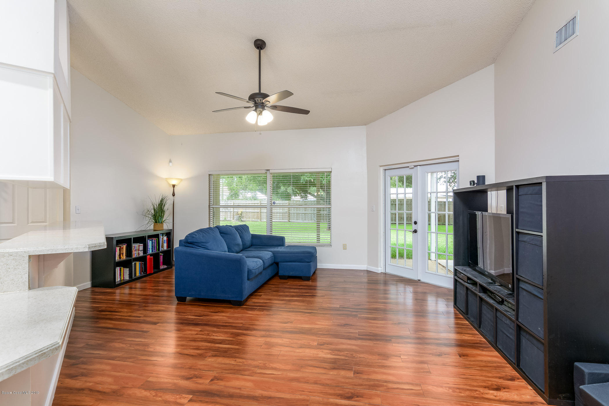 7010 Cairo Road Cocoa, FL 32927 - Photo 10 of 22 a living room with furniture and a flat screen tv