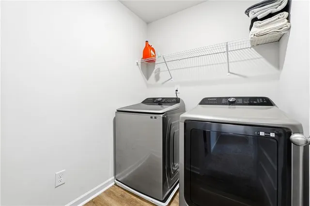 a utility room with dryer and washer