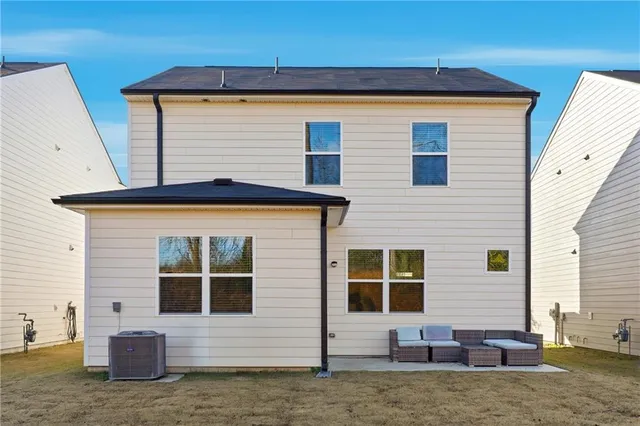 a front view of a house with garage
