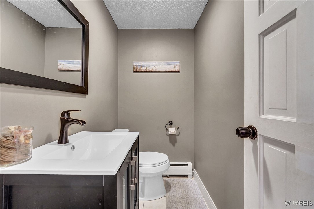 9681 Wagner Road Holland, NY 14080 - Photo 26 of 50 main floor half bath