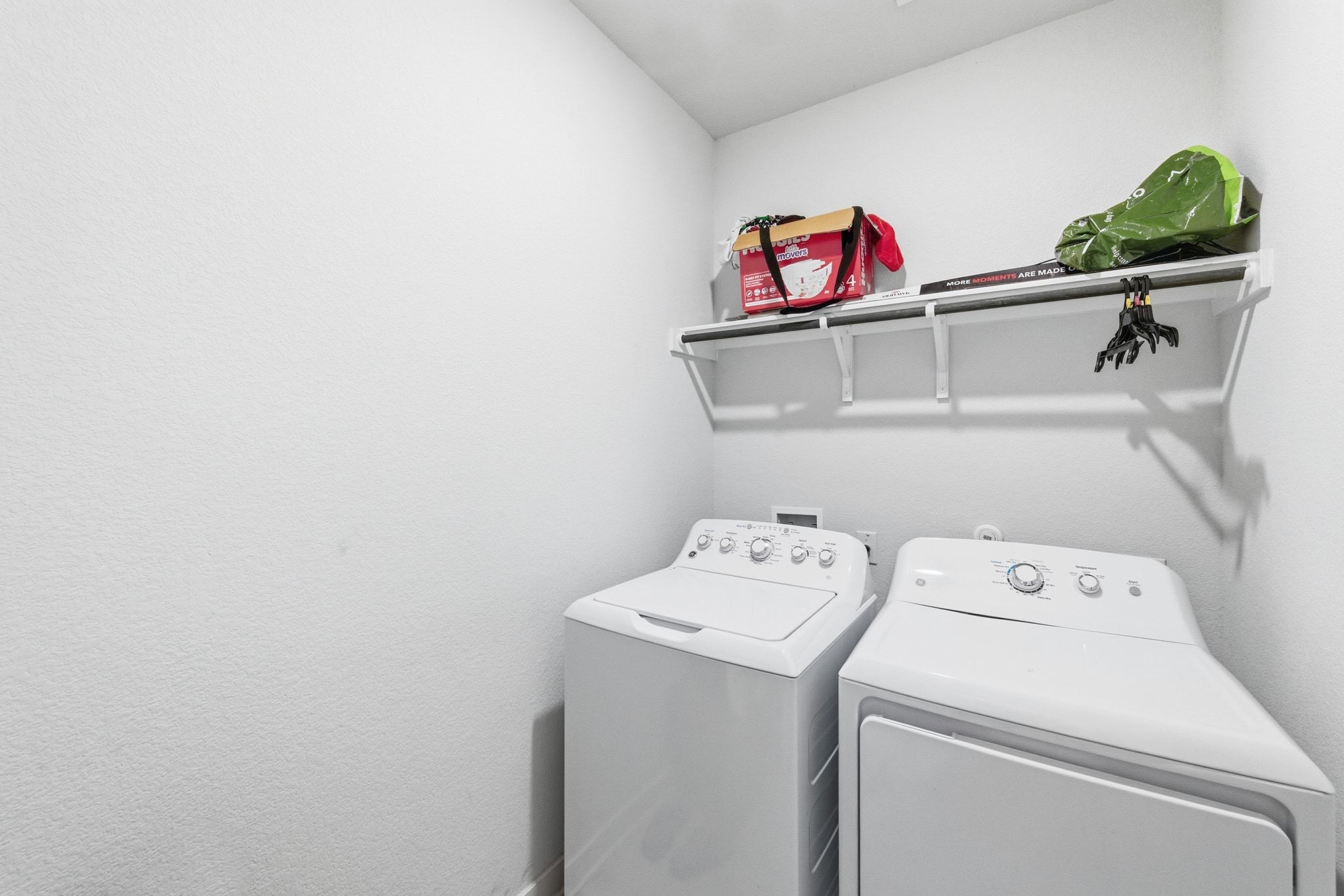 241 Banff Drive Kyle, TX 78640 - Photo 22 of 28 a utility room with dryer and washer