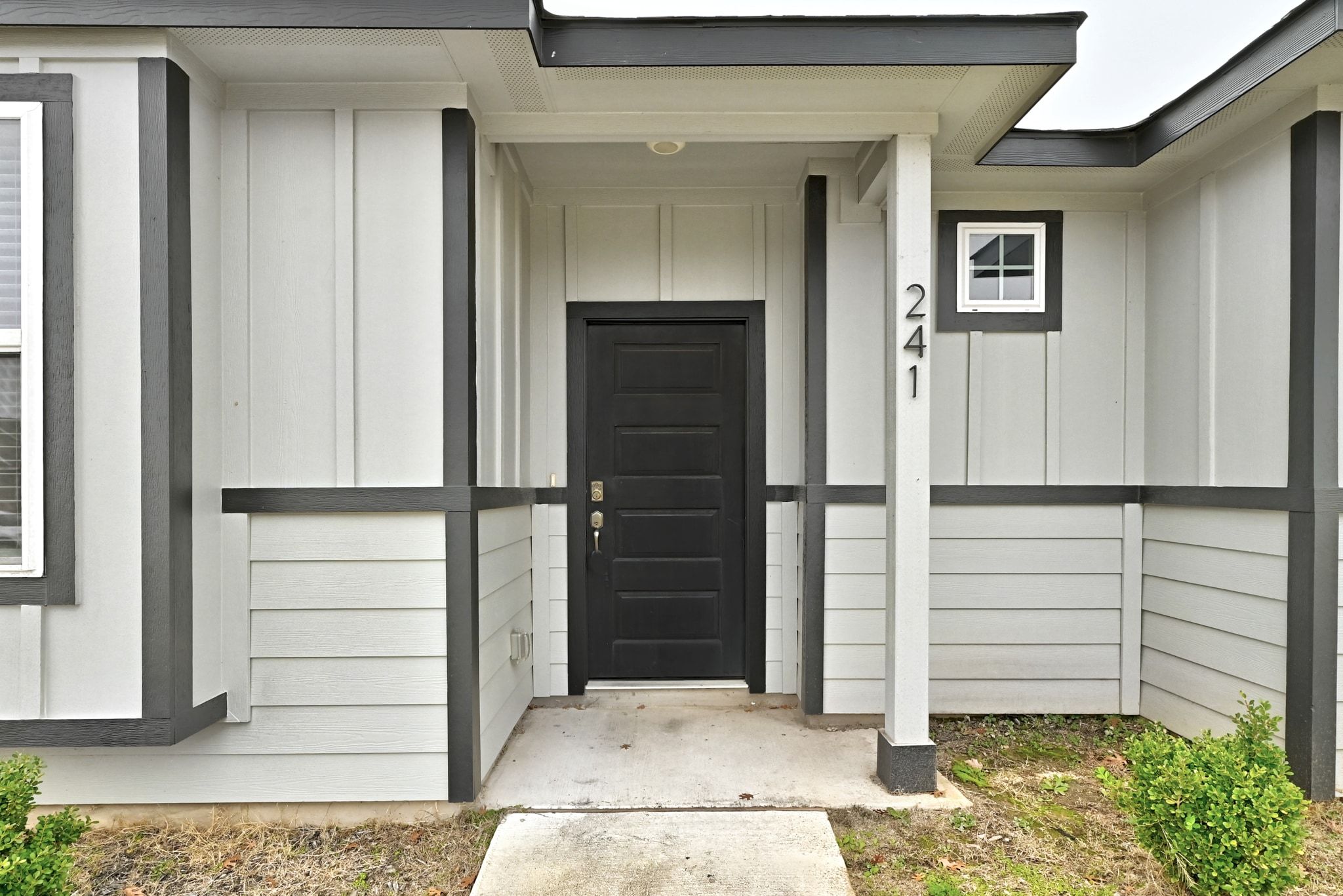 241 Banff Drive Kyle, TX 78640 - Photo 3 of 28 a view of front door and bedroom