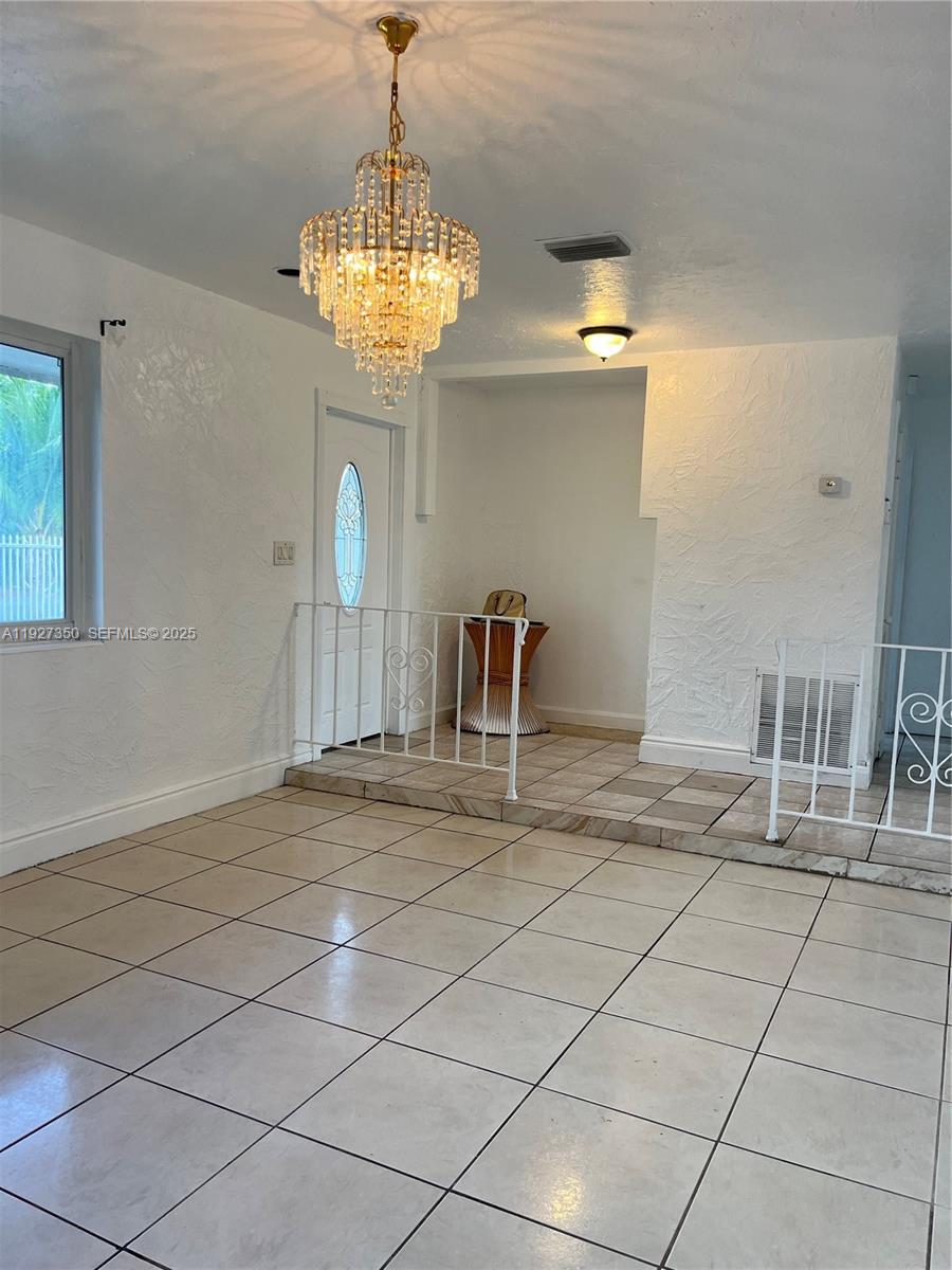 150 Northeast 173rd Street Miami, FL 33162 - Photo 7 of 10 a view of a storage & utility room