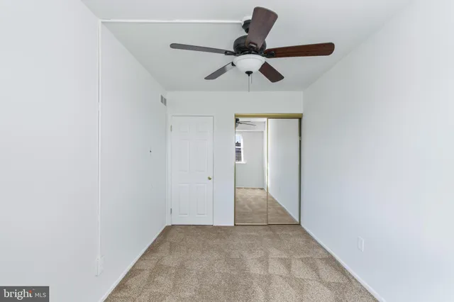 a bathroom with a shower and a bath tub