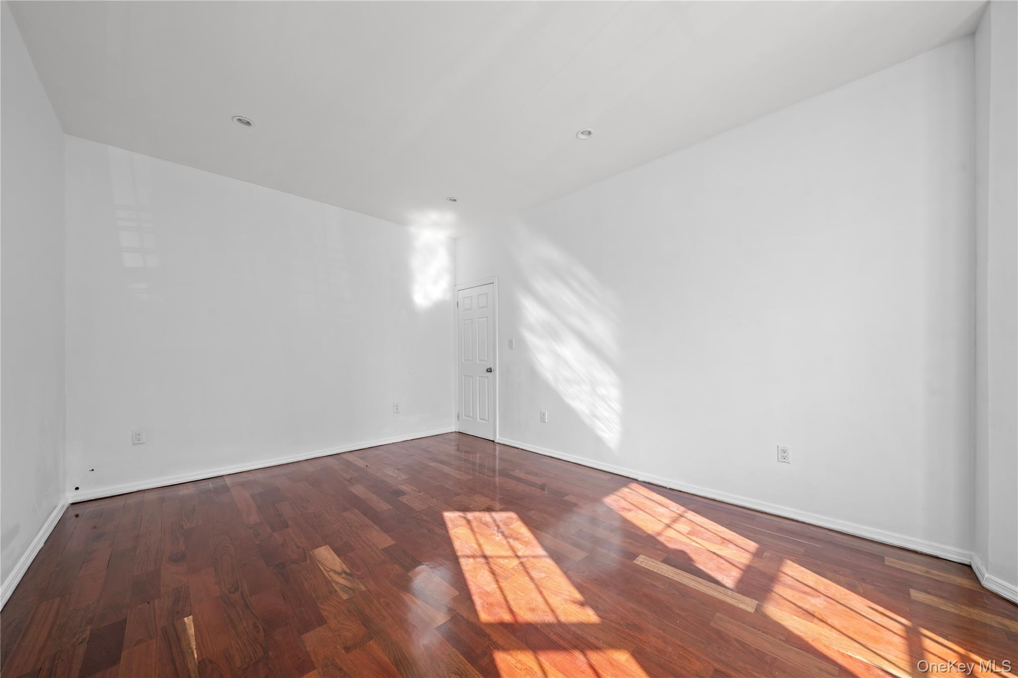 1323 Sutter Avenue Brooklyn, NY 11208 - Photo 16 of 46 a view of an empty room and window