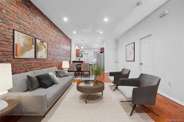 a living room with furniture and a table