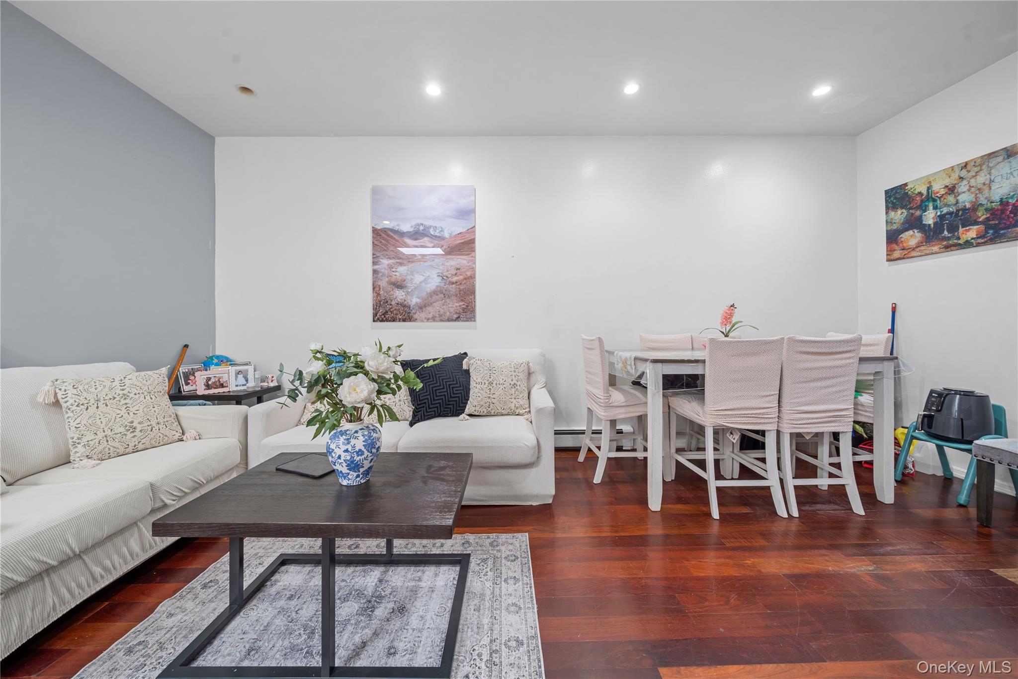1323 Sutter Avenue Brooklyn, NY 11208 - Photo 21 of 46 a living room with furniture wooden floor and dining table