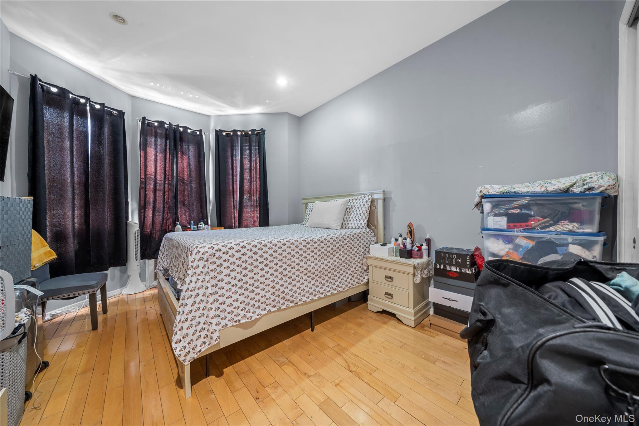 1323 Sutter Avenue Brooklyn, NY 11208 - Photo 25 of 46 a bedroom with a bed and furniture
