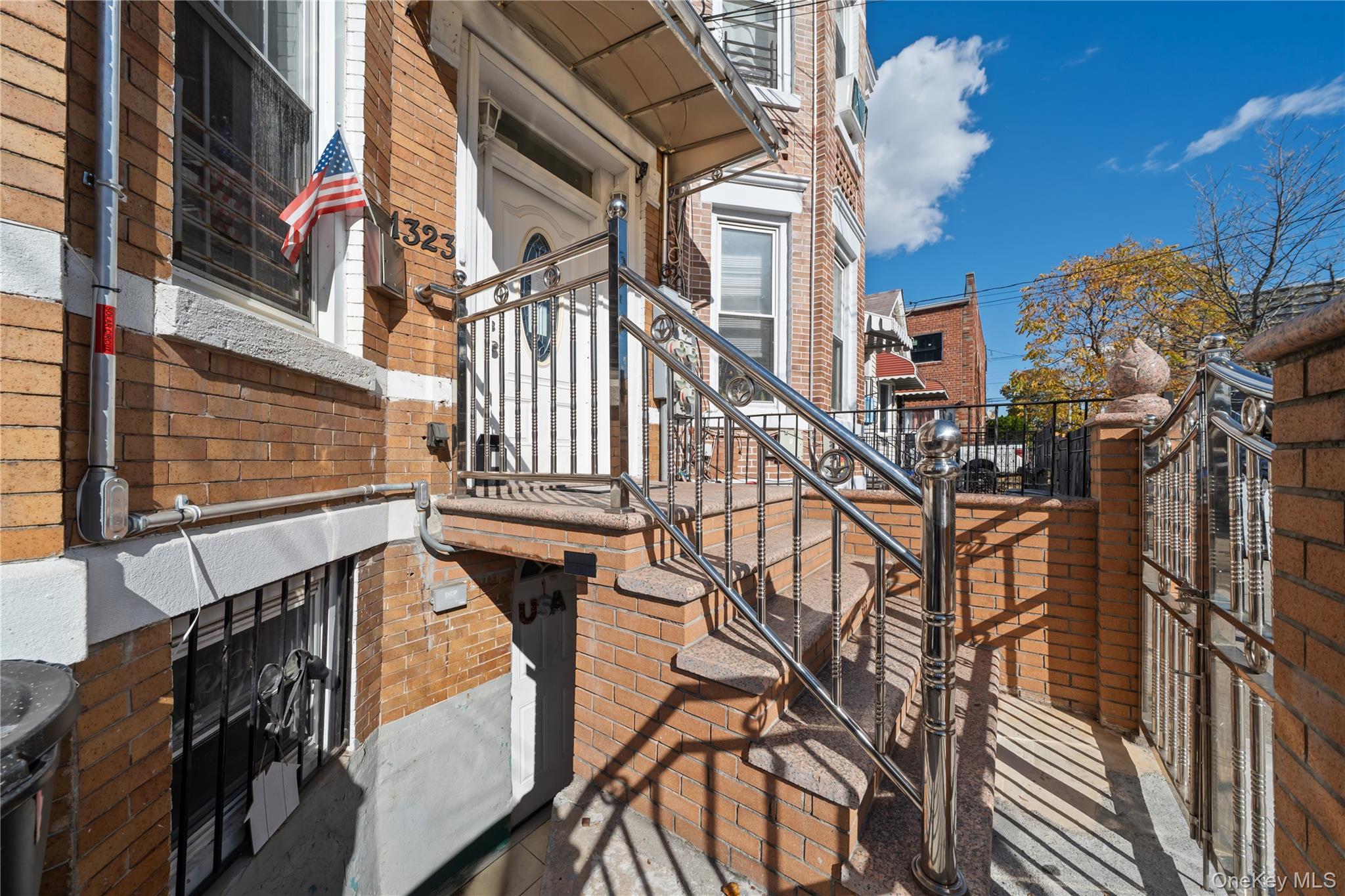 1323 Sutter Avenue Brooklyn, NY 11208 - Photo 40 of 46 a view of entryway with a front door