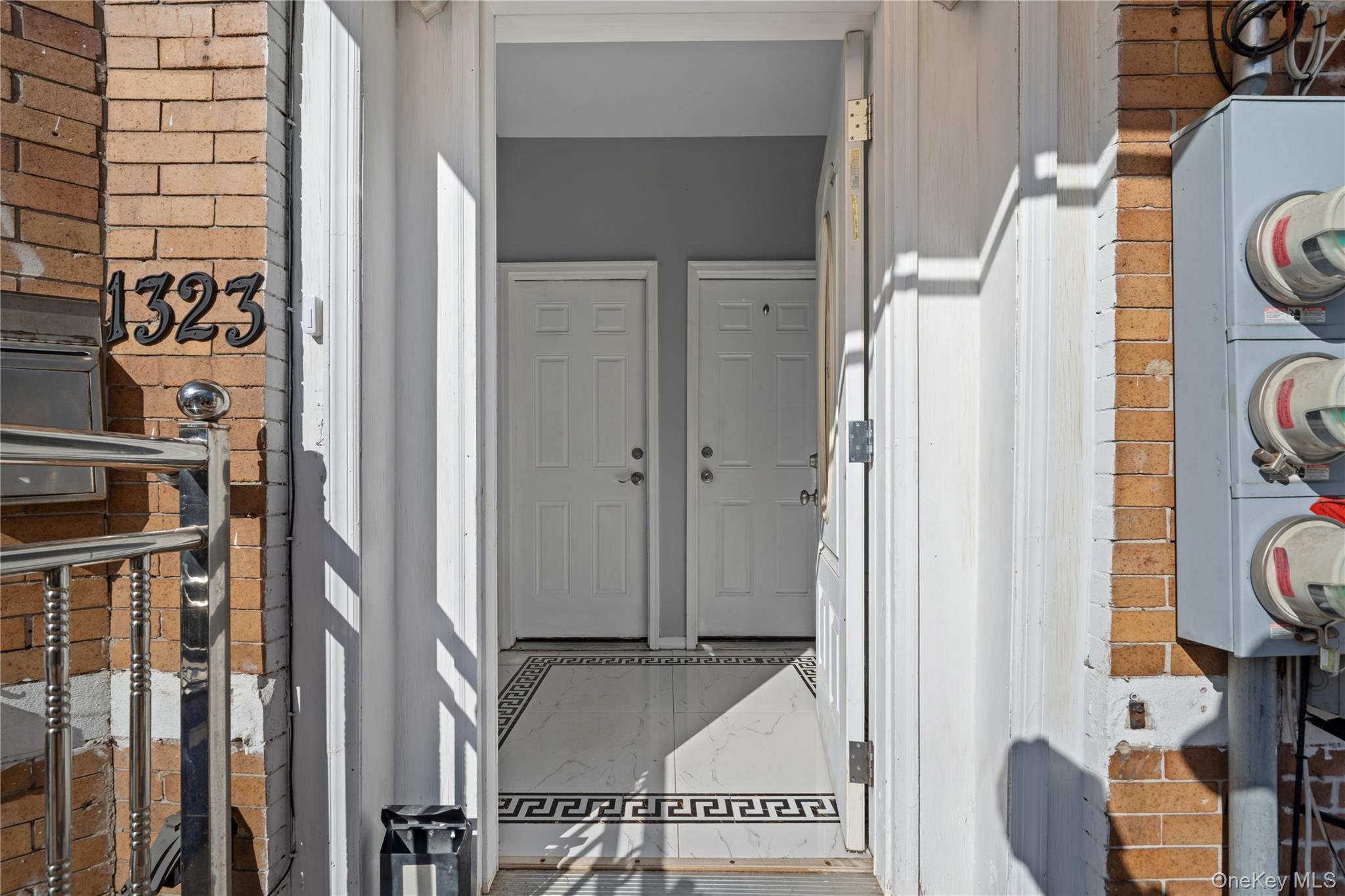 1323 Sutter Avenue Brooklyn, NY 11208 - Photo 41 of 46 a view of a entryway with washer and dryer