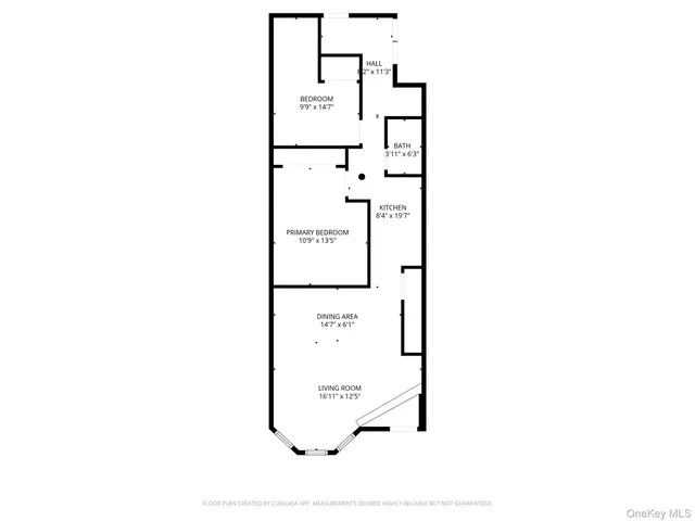 a picture of a bench in front of a wall