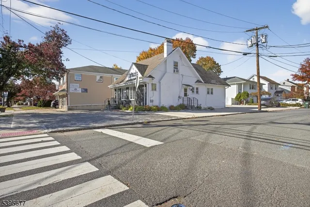 a view of a house with a street