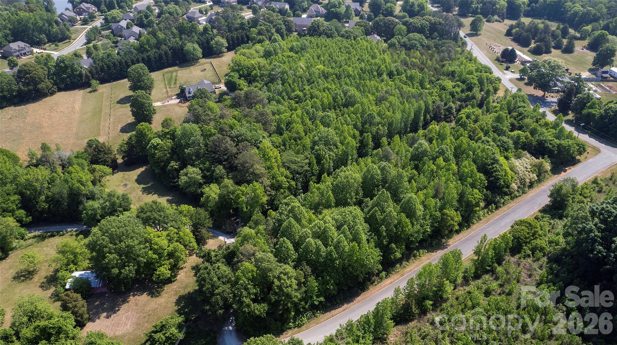 8115 Brief Road Mint Hill, NC 28227 - Photo 3 of 10 an aerial view of a house with a yard