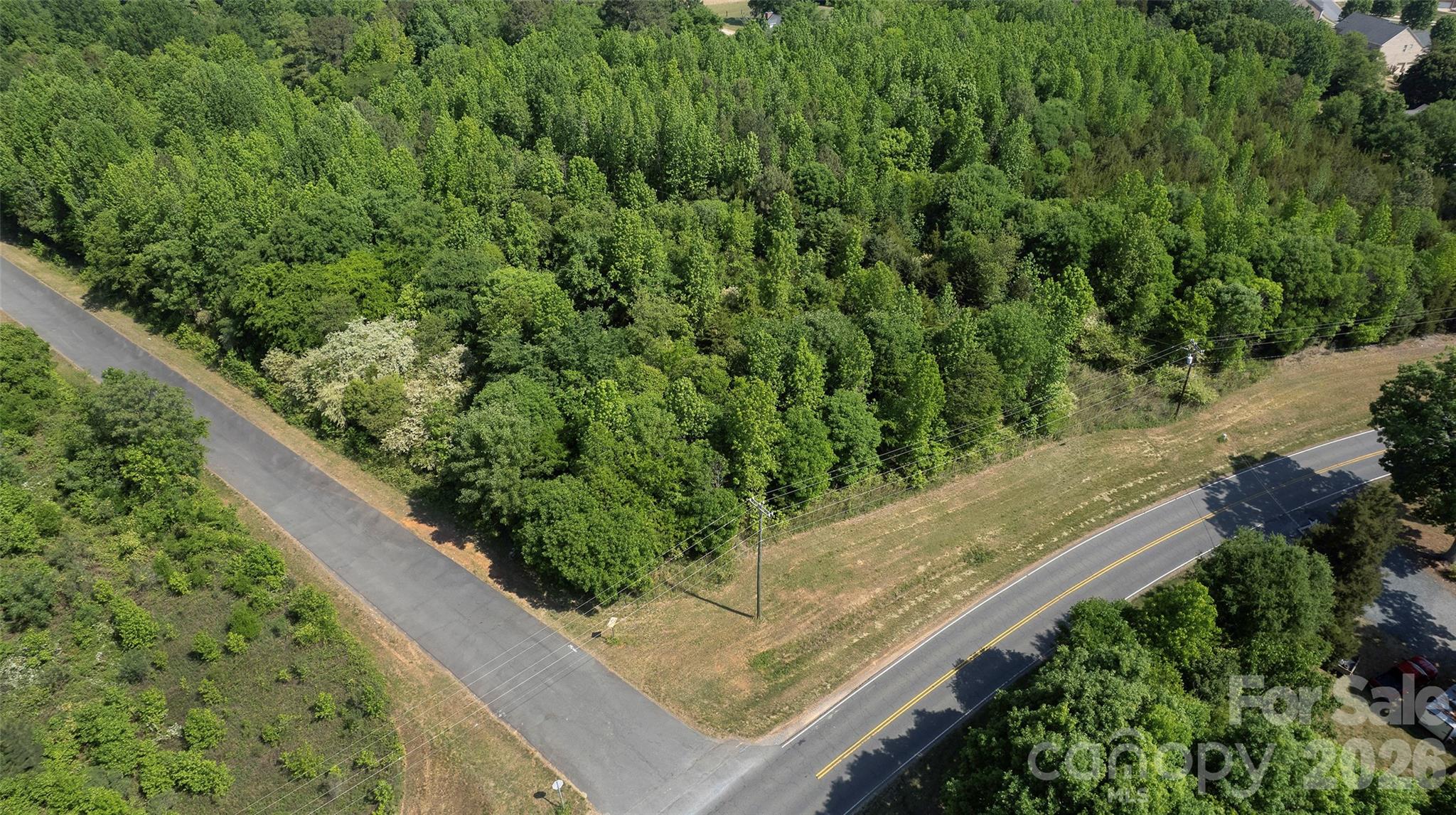8115 Brief Road Mint Hill, NC 28227 - Photo 4 of 10 a view of a garden with a street