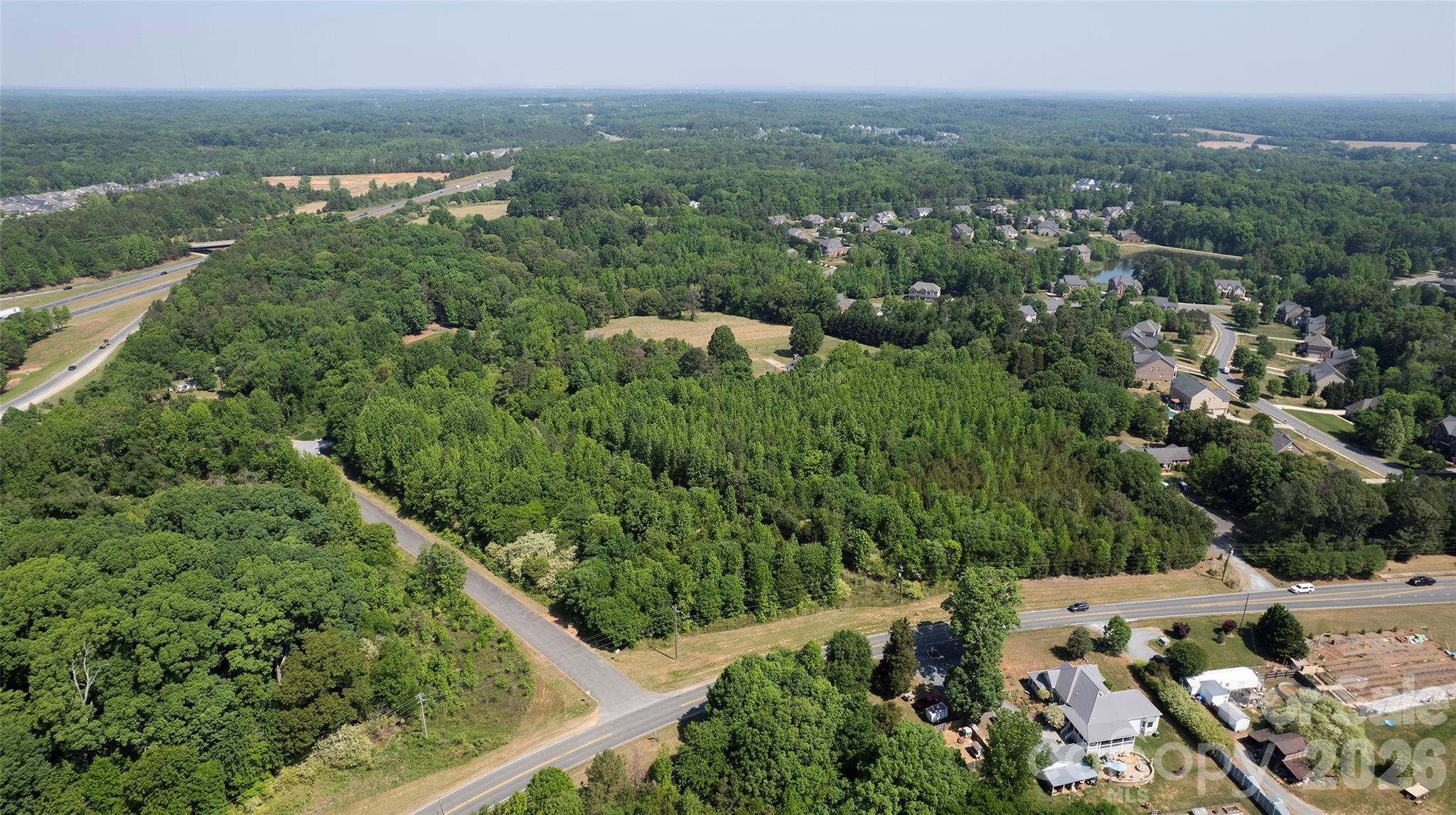 8115 Brief Road Mint Hill, NC 28227 - Photo 5 of 10 an aerial view of multiple house