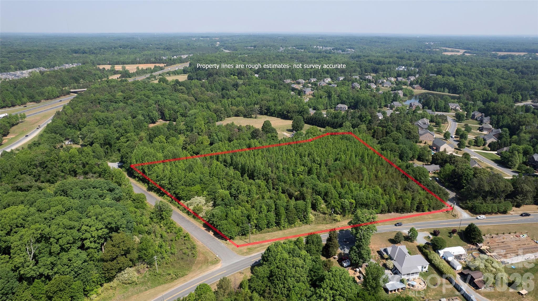 8115 Brief Road Mint Hill, NC 28227 - Photo 6 of 10 an aerial view of multiple house