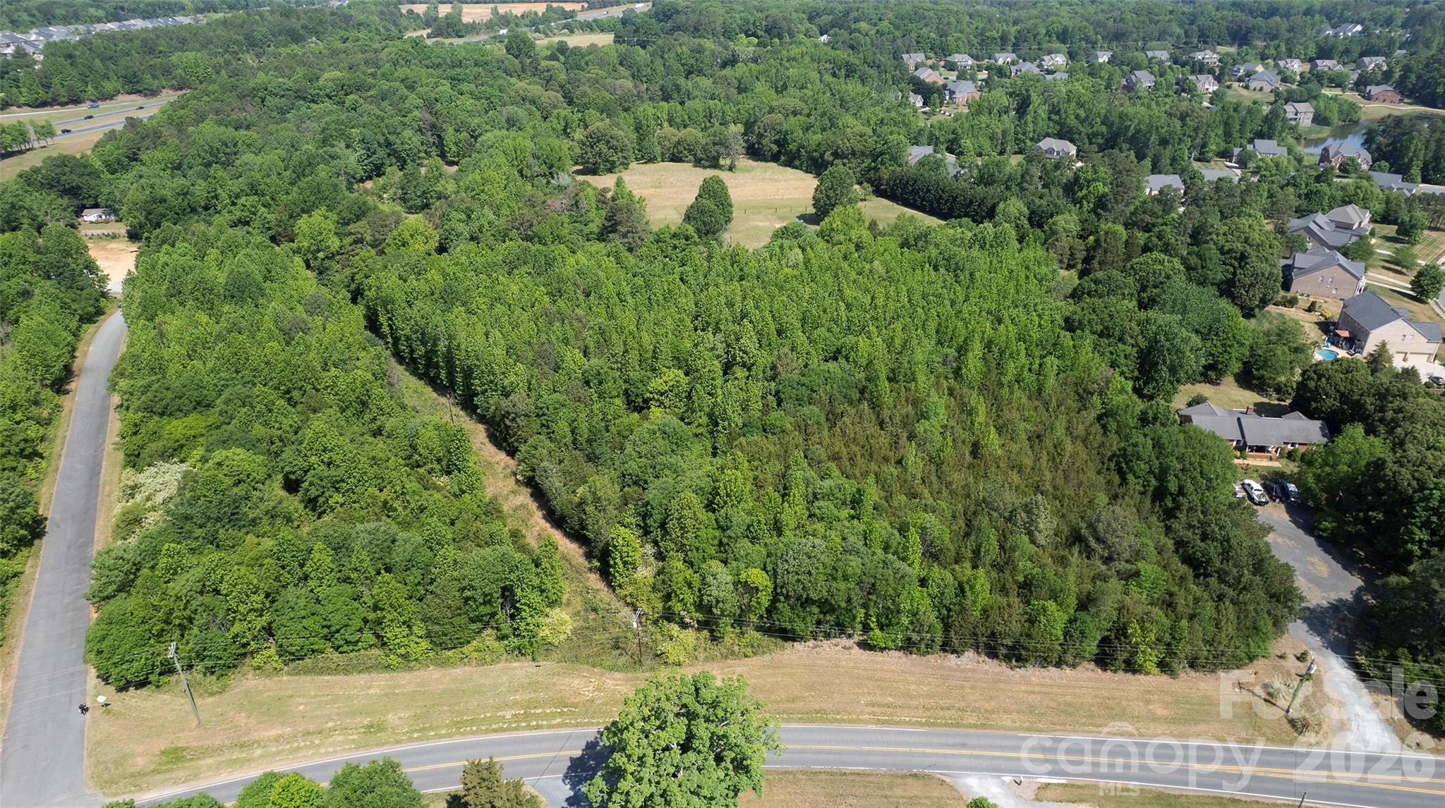 8115 Brief Road Mint Hill, NC 28227 - Photo 7 of 10 an aerial view of a house with a yard