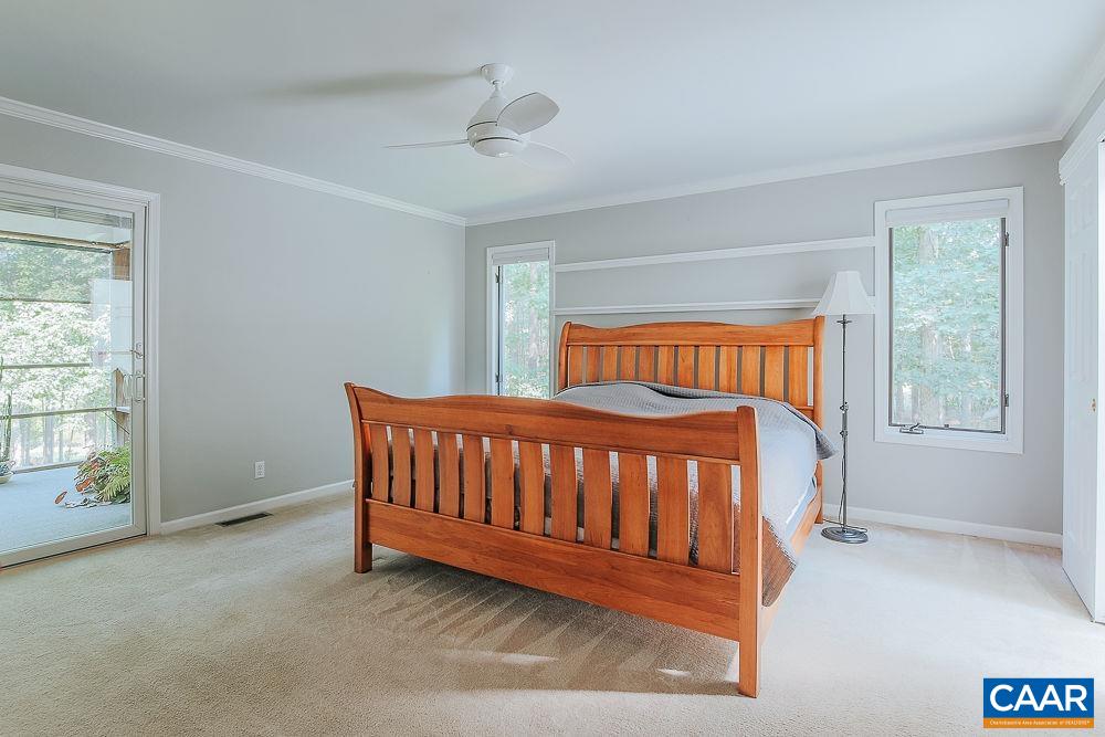 2300 Gobblers Ridge Charlottesville, VA 22902 - Photo 17 of 37 a bedroom with a bed and a window