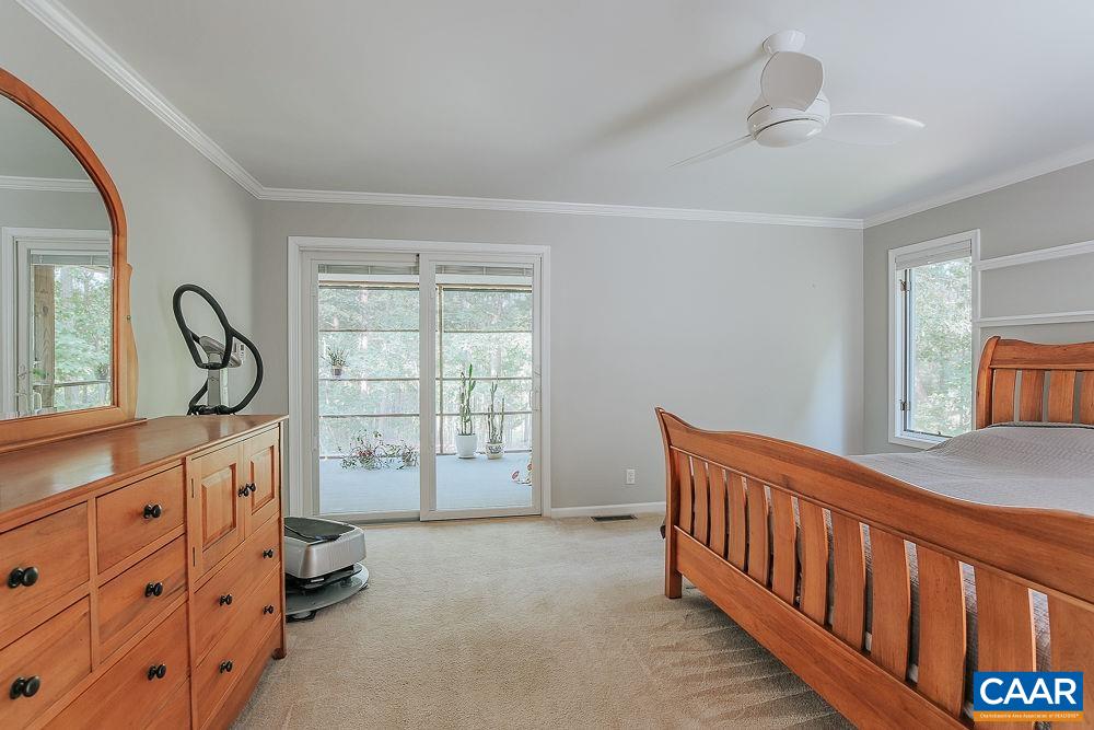 2300 Gobblers Ridge Charlottesville, VA 22902 - Photo 18 of 37 a bedroom with furniture and a window