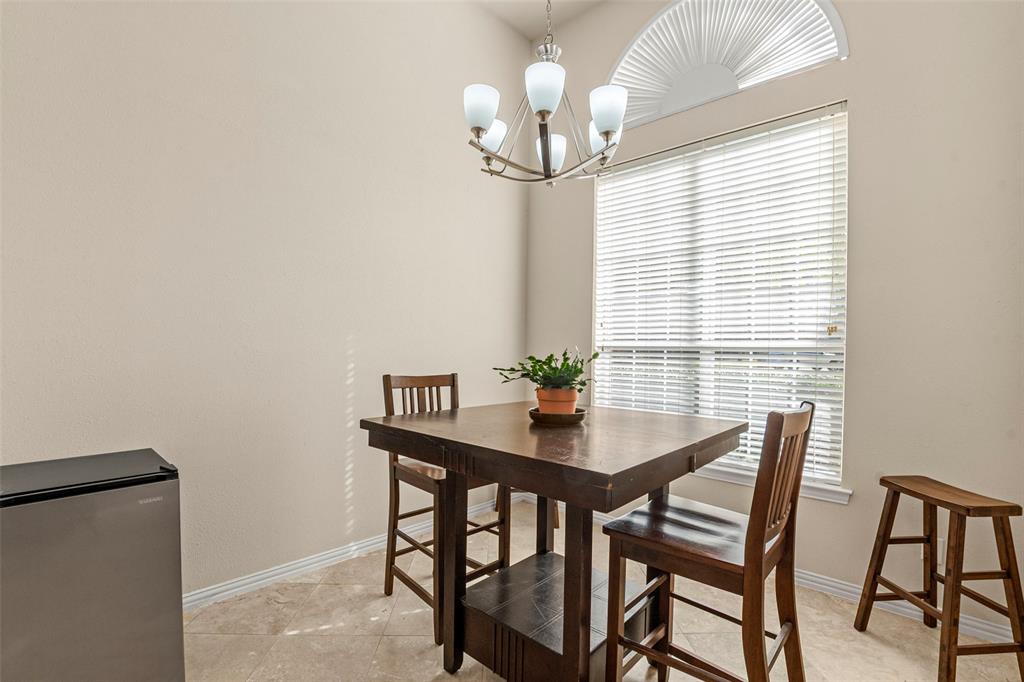 1200 Rio Bravo Way Shady Shores, TX 76208 - Photo 13 of 39 a view of a dining room with furniture and chandelier