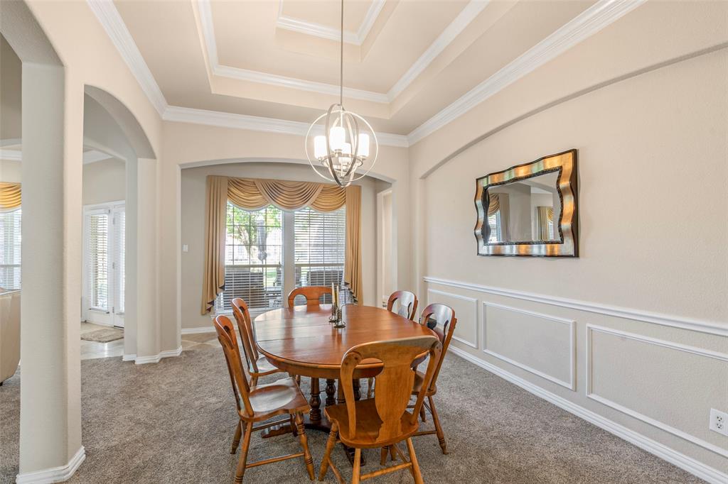 1200 Rio Bravo Way Shady Shores, TX 76208 - Photo 18 of 39 a view of a dining room with furniture and chandelier