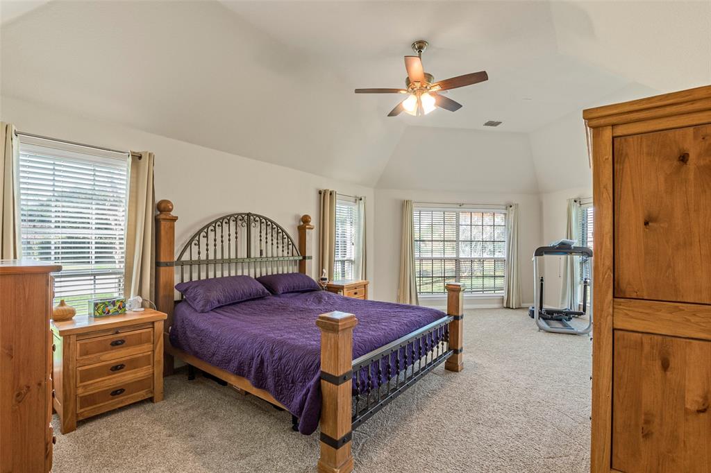 1200 Rio Bravo Way Shady Shores, TX 76208 - Photo 19 of 39 a bedroom with a bed and a window