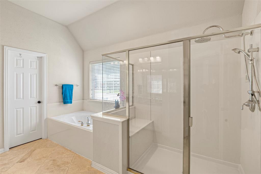 1200 Rio Bravo Way Shady Shores, TX 76208 - Photo 22 of 39 a bathroom with a bathtub and a shower