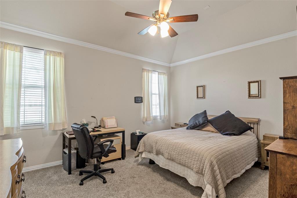 1200 Rio Bravo Way Shady Shores, TX 76208 - Photo 25 of 39 a bedroom with a bed a computer on a desk and chair