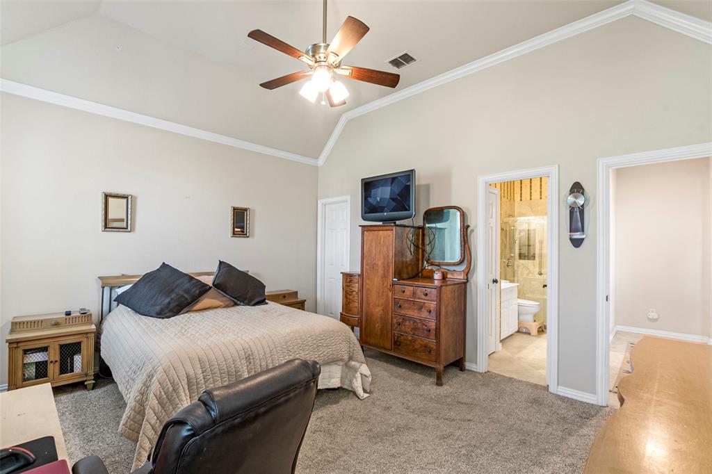 1200 Rio Bravo Way Shady Shores, TX 76208 - Photo 26 of 39 a bedroom with a bed and wooden floor