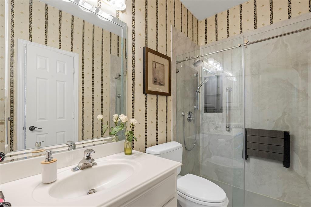 1200 Rio Bravo Way Shady Shores, TX 76208 - Photo 27 of 39 a bathroom with a sink toilet and shower
