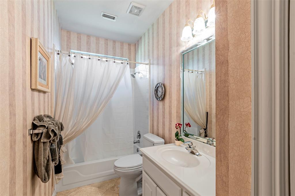 1200 Rio Bravo Way Shady Shores, TX 76208 - Photo 30 of 39 a bathroom with a sink toilet and shower