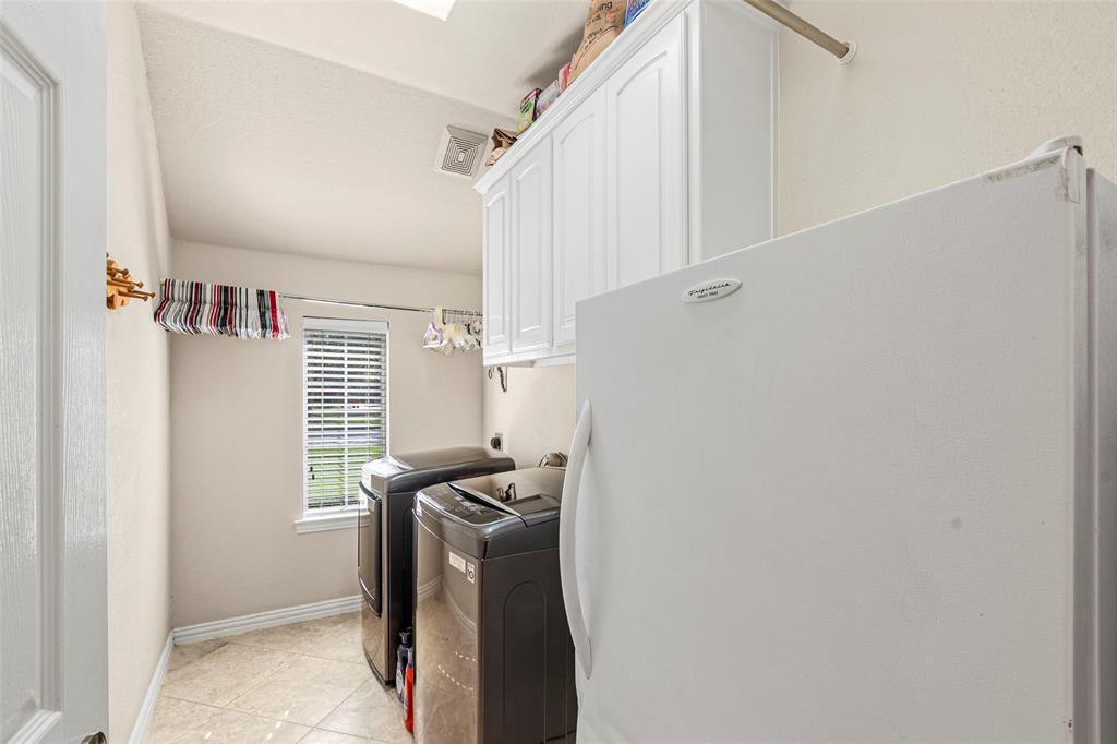 1200 Rio Bravo Way Shady Shores, TX 76208 - Photo 33 of 39 a view of storage and utility room with windows